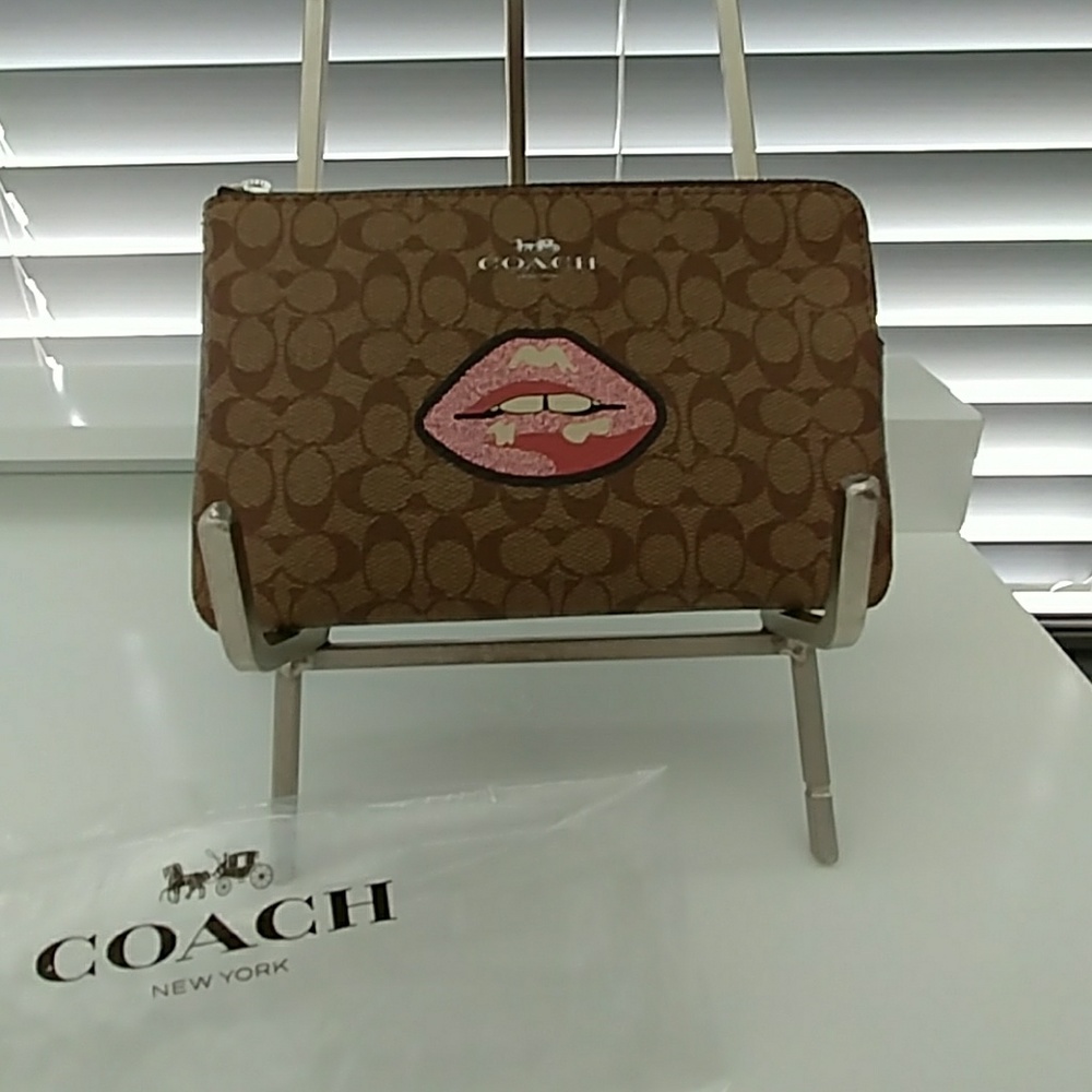 NWT COACH medium sized wristlet